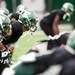EMU players warms up during the spring practice on Sunday, April 14. AnnArbor.com I Daniel Brenner